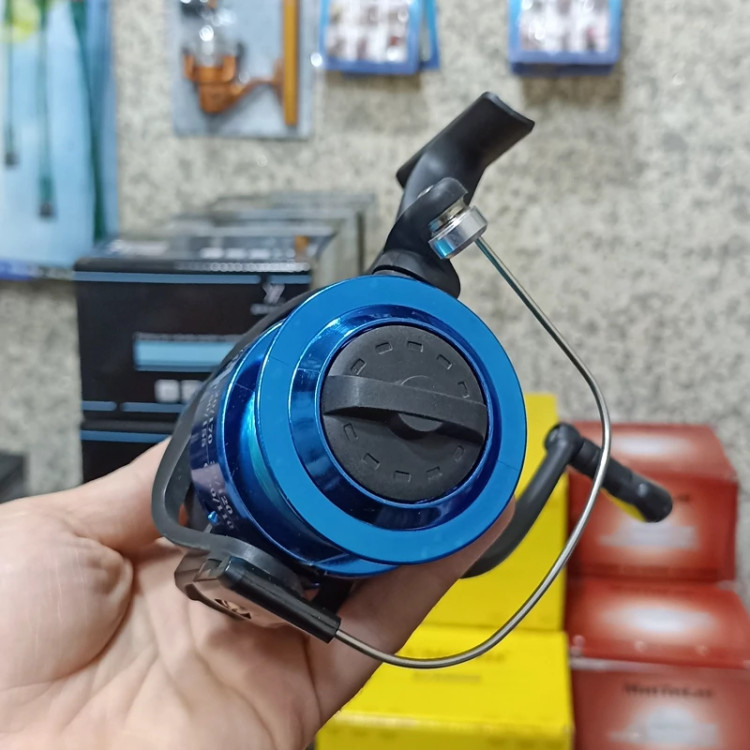 چرخ ماهیگیری 7000 برند بیلیش به همراه نخ مدل CH7000 مناسب برای چوب ماهیگیری لنسر ماهیگیری