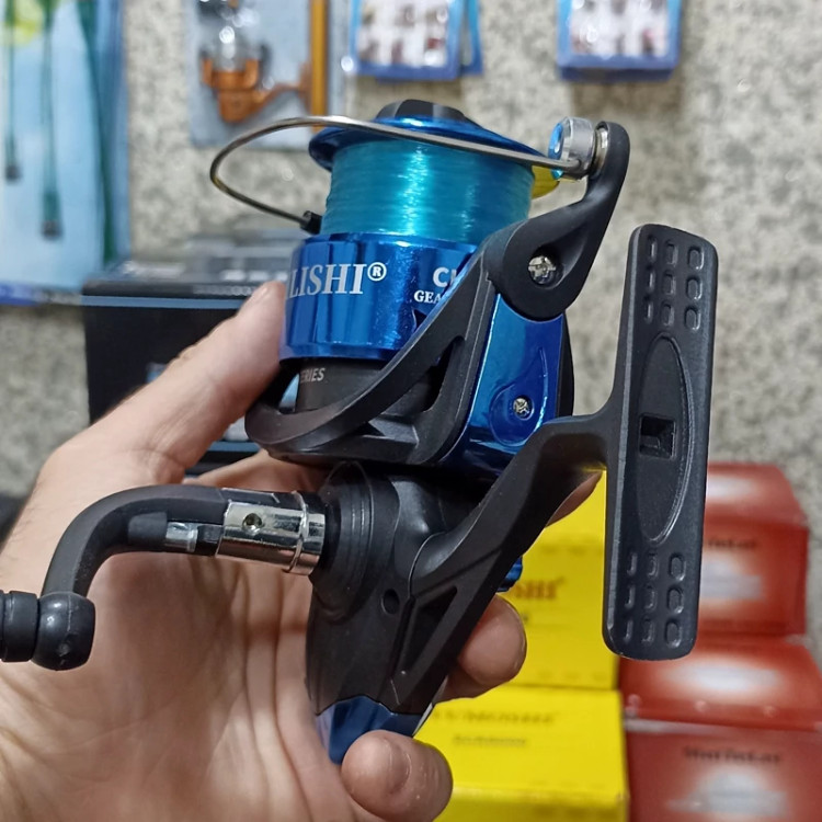چرخ ماهیگیری 7000 برند بیلیش به همراه نخ مدل CH7000 مناسب برای چوب ماهیگیری لنسر ماهیگیری