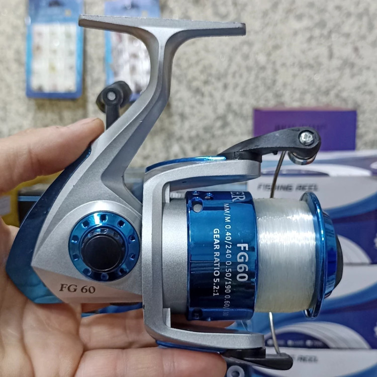 چرخ ماهیگیری 7000 برند دیوزن به همراه نخ مدل FG60 مناسب برای چوب ماهیگیری لنسر ماهیگیری