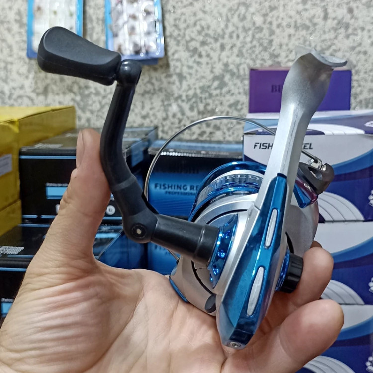 چرخ ماهیگیری 7000 برند دیوزن به همراه نخ مدل FG60 مناسب برای چوب ماهیگیری لنسر ماهیگیری