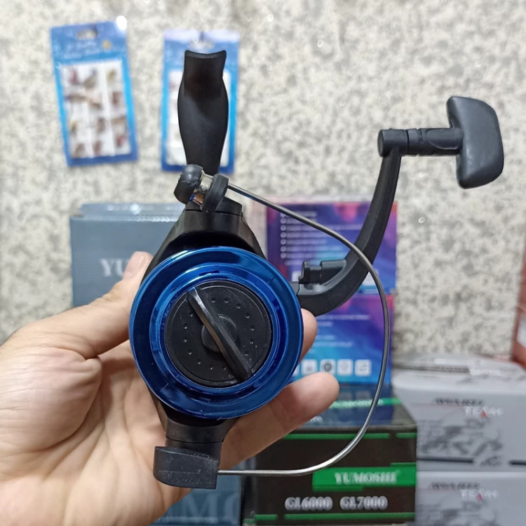 چرخ ماهیگیری 6000 برند فیشینگ ریئل مدل GM6000 مناسب برای چوب ماهیگیری لنسر ماهیگیری
