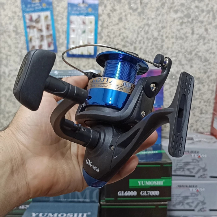 چرخ ماهیگیری 6000 برند فیشینگ ریئل مدل GM6000 مناسب برای چوب ماهیگیری لنسر ماهیگیری