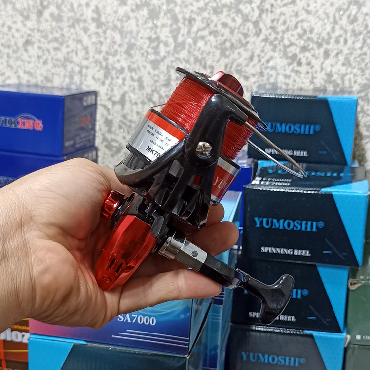 چرخ ماهیگیری 7000 برند یوموشی به همراه نخ مدل MK7000 مناسب برای چوب ماهیگیری لنسر ماهیگیری