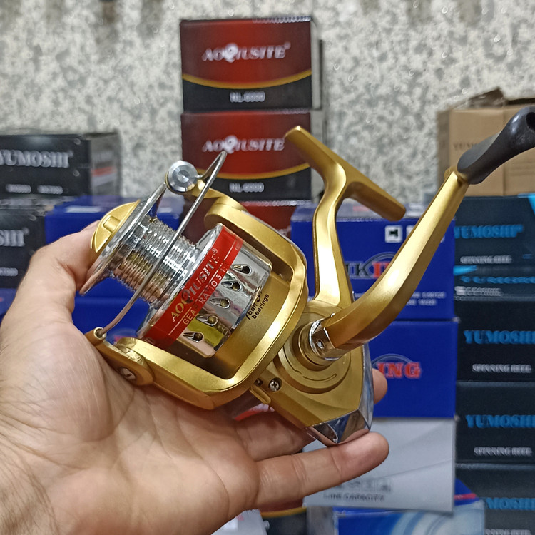 چرخ ماهیگیری 6000 برند اکوستی مدل NL gold 6000 مناسب برای چوب ماهیگیری لنسر ماهیگیری